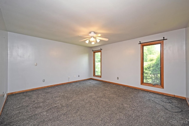 8424 Oak Grove Rd, Georgetown, OH 45121 - spare room featuring carpet flooring and a ceiling fan
