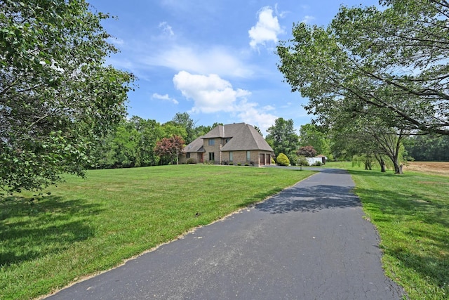 8424 Oak Grove Rd, Georgetown, OH 45121 - view of front of property featuring a front yard and asphalt driveway