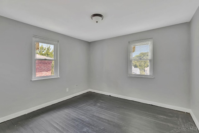 146 Glenridge Pl, Cincinnati, OH 45217 - spare room with healthy amount of natural light and dark wood-style flooring