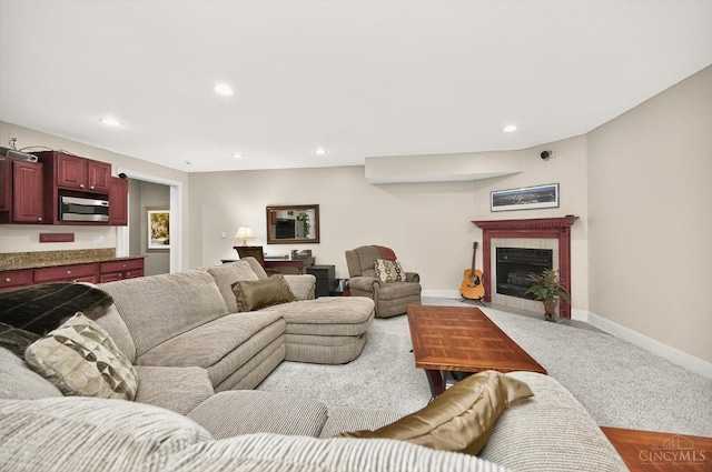 8069 Green Lake Dr, Liberty Twp, OH 45044 - living area featuring a tile fireplace and recessed lighting