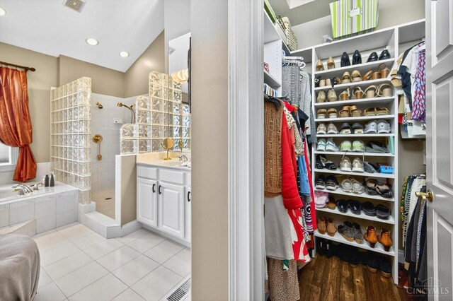 8069 Green Lake Dr, Liberty Twp, OH 45044 - spacious closet featuring light tile patterned floors and a sink
