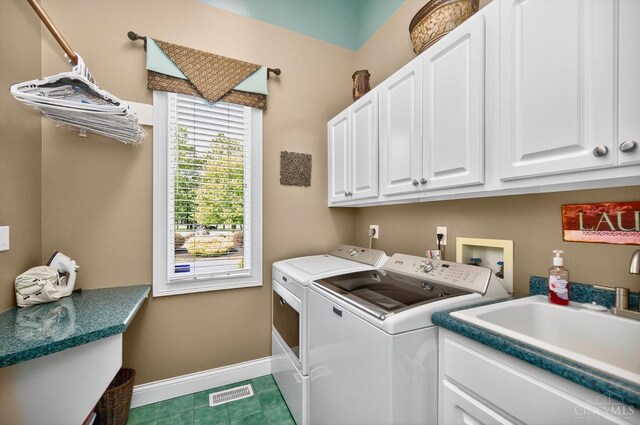 8069 Green Lake Dr, Liberty Twp, OH 45044 - washroom with cabinet space and washing machine and clothes dryer