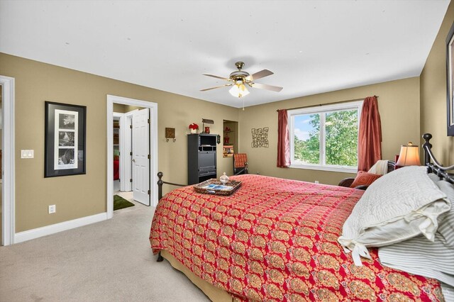 8069 Green Lake Dr, Liberty Twp, OH 45044 - bedroom with light colored carpet and ceiling fan