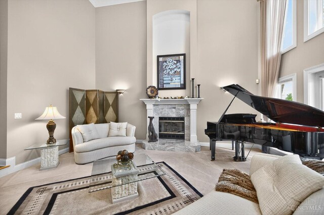 8069 Green Lake Dr, Liberty Twp, OH 45044 - carpeted living area featuring a high ceiling and a fireplace