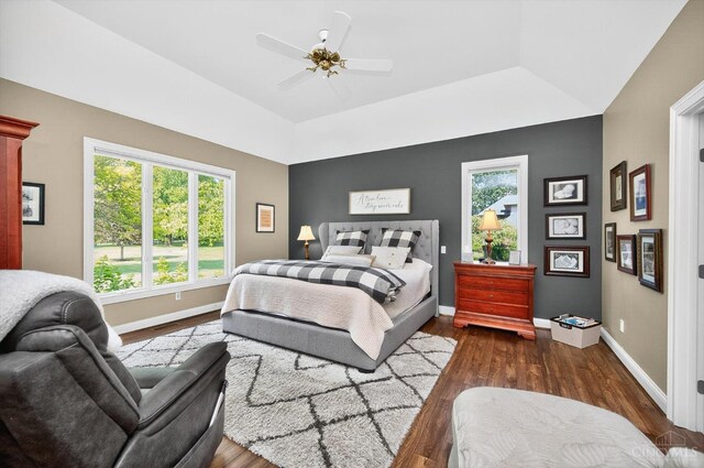 8069 Green Lake Dr, Liberty Twp, OH 45044 - bedroom featuring dark wood-style floors, ceiling fan, and a raised ceiling