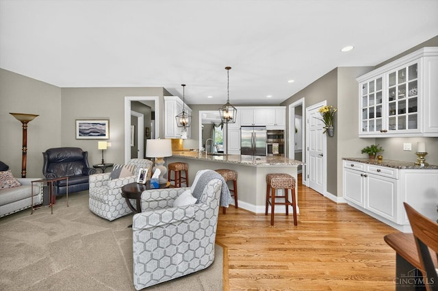 8069 Green Lake Dr, Liberty Twp, OH 45044 - living room featuring light wood-style floors and recessed lighting