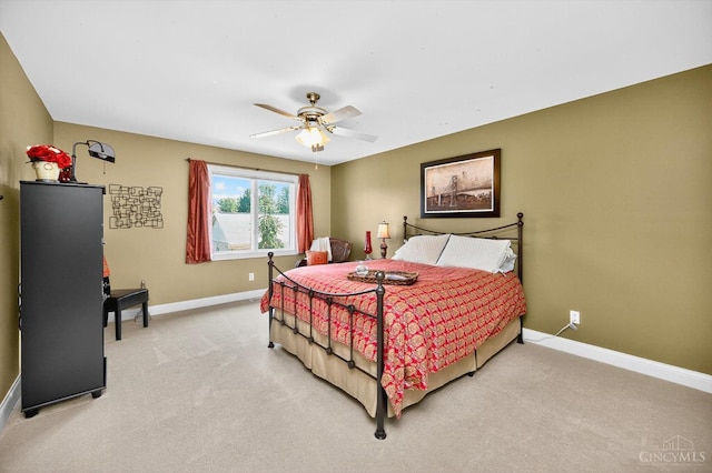 8069 Green Lake Dr, Liberty Twp, OH 45044 - bedroom featuring light carpet and ceiling fan