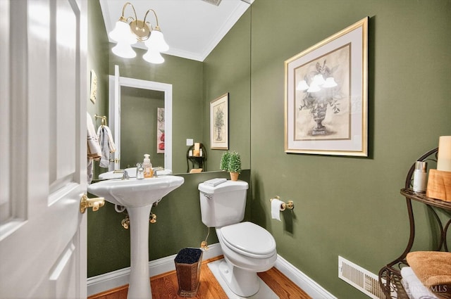 8069 Green Lake Dr, Liberty Twp, OH 45044 - bathroom with ornamental molding, a chandelier, and wood finished floors