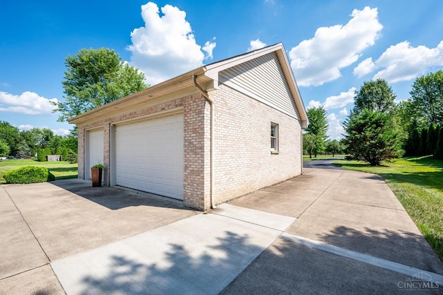 8069 Green Lake Dr, Liberty Twp, OH 45044 - view of side of home with brick siding and a yard