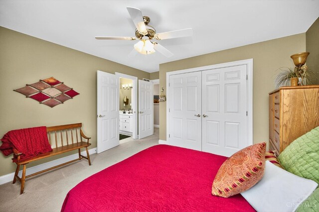 8069 Green Lake Dr, Liberty Twp, OH 45044 - bedroom featuring a closet, carpet flooring, a ceiling fan, and ensuite bath
