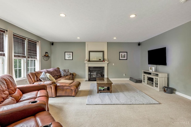 1820 Meadow Sweet Dr, Turtle Creek Twp, OH 45036 - carpeted living area featuring a large fireplace and recessed lighting