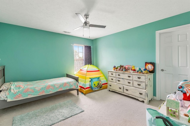 1820 Meadow Sweet Dr, Turtle Creek Twp, OH 45036 - carpeted bedroom featuring a textured ceiling and a ceiling fan