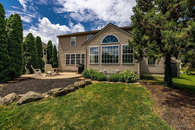 1820 Meadow Sweet Dr, Turtle Creek Twp, OH 45036 - back of house with a yard and a patio area