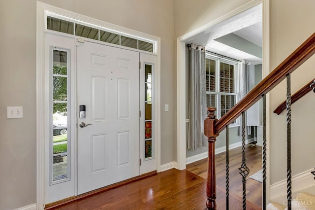 1820 Meadow Sweet Dr, Turtle Creek Twp, OH 45036 - foyer entrance featuring wood finished floors and baseboards
