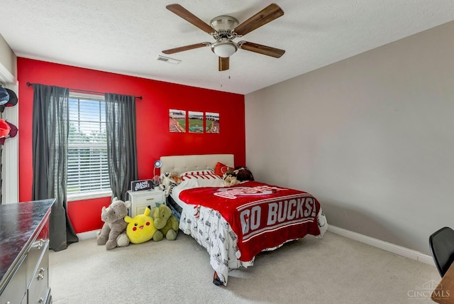 1820 Meadow Sweet Dr, Turtle Creek Twp, OH 45036 - carpeted bedroom featuring a textured ceiling and a ceiling fan