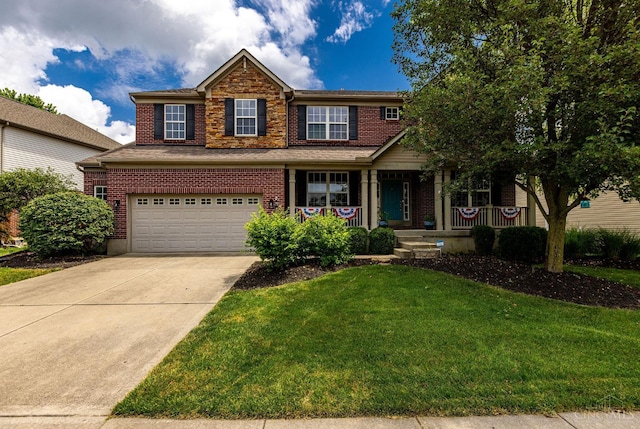 1820 Meadow Sweet Dr, Turtle Creek Twp, OH 45036 - view of front facade with an attached garage, concrete driveway, a front lawn, brick siding, and covered porch