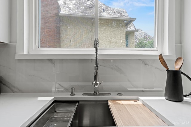 4150 Paddock Rd, Cincinnati, OH 45229 - kitchen view of tasteful backsplash and light countertops