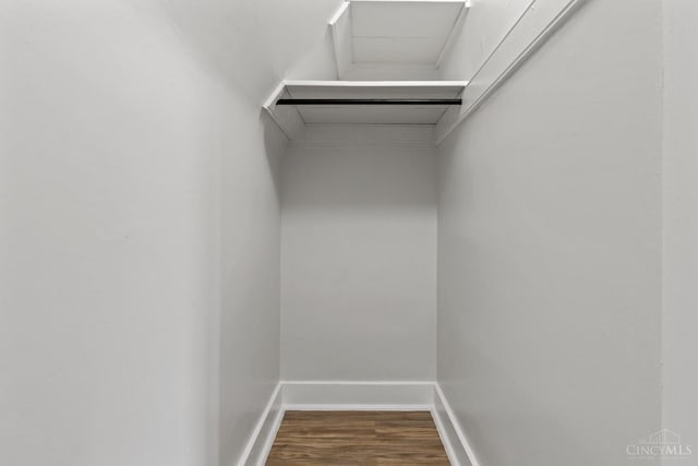 4150 Paddock Rd, Cincinnati, OH 45229 - walk in closet featuring attic access and wood finished floors