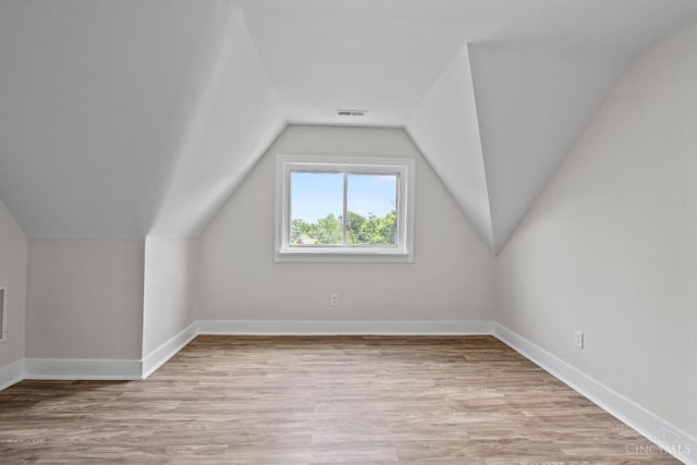 4150 Paddock Rd, Cincinnati, OH 45229 - additional living space with lofted ceiling and light wood-style flooring
