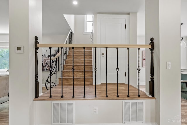 4150 Paddock Rd, Cincinnati, OH 45229 - stairs with baseboards and wood finished floors