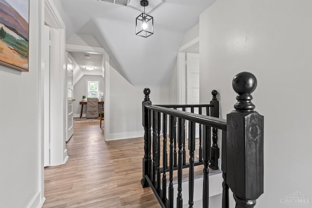 4150 Paddock Rd, Cincinnati, OH 45229 - hall with an upstairs landing, light wood-style flooring, and lofted ceiling