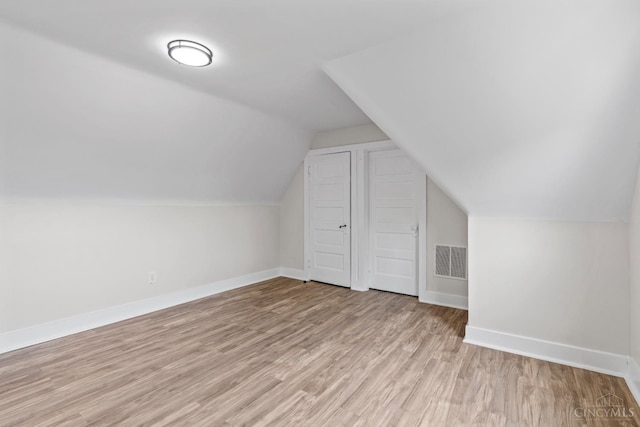 4150 Paddock Rd, Cincinnati, OH 45229 - additional living space with light wood finished floors and vaulted ceiling