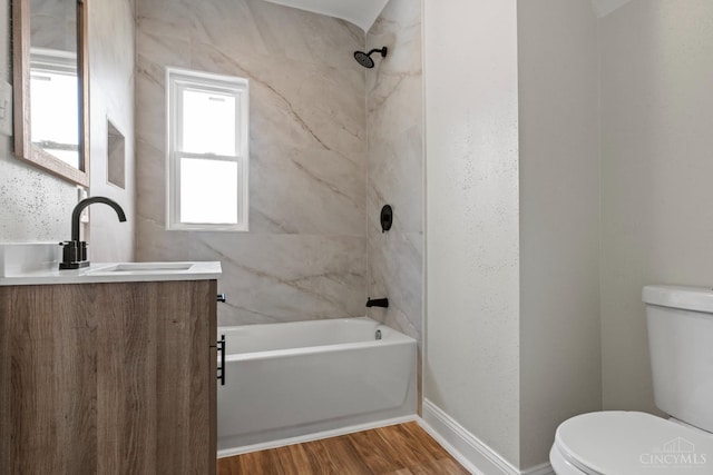 4150 Paddock Rd, Cincinnati, OH 45229 - full bathroom featuring vanity, bathtub / shower combination, and wood finished floors