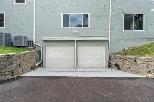 4150 Paddock Rd, Cincinnati, OH 45229 - garage with asphalt driveway