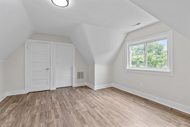 4150 Paddock Rd, Cincinnati, OH 45229 - additional living space with light wood-style floors and lofted ceiling