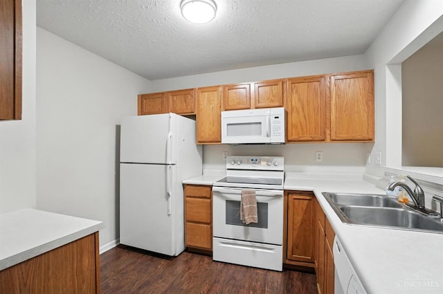 5433 Harbourwatch Unit 104, Deerfield Twp, OH 45040 - kitchen with white appliances, dark wood-type flooring, light countertops, and brown cabinets