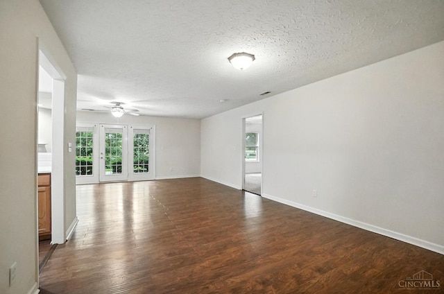 5433 Harbourwatch Unit 104, Deerfield Twp, OH 45040 - spare room featuring ceiling fan, dark wood-style floors, and a textured ceiling