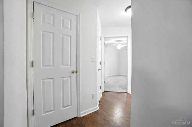 5433 Harbourwatch Unit 104, Deerfield Twp, OH 45040 - hallway featuring dark wood-style floors and baseboards