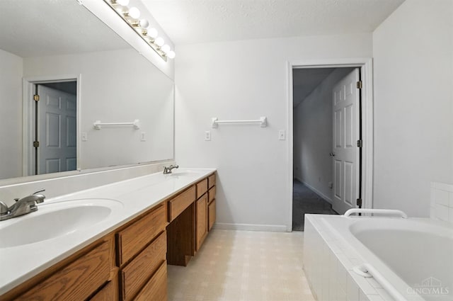 5433 Harbourwatch Unit 104, Deerfield Twp, OH 45040 - bathroom with double vanity and a garden tub