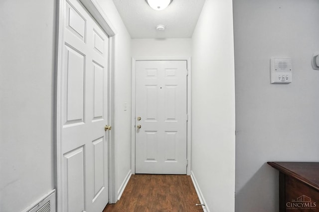5433 Harbourwatch Unit 104, Deerfield Twp, OH 45040 - hallway featuring dark wood-type flooring and baseboards