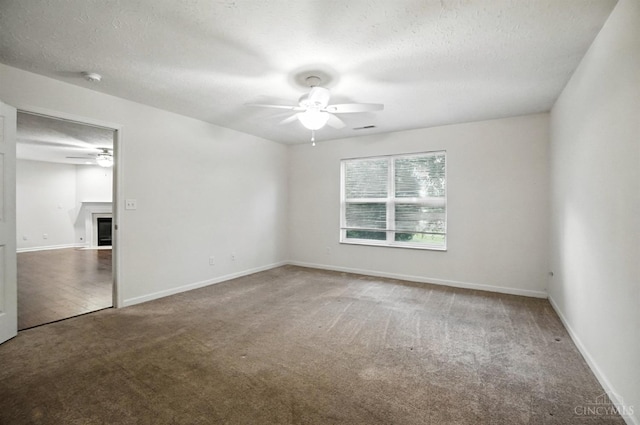 5433 Harbourwatch Unit 104, Deerfield Twp, OH 45040 - unfurnished room with ceiling fan, carpet floors, a textured ceiling, and a smoke detector