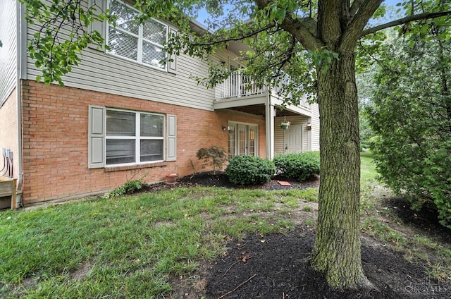 5433 Harbourwatch Unit 104, Deerfield Twp, OH 45040 - view of front of house with a balcony and brick siding