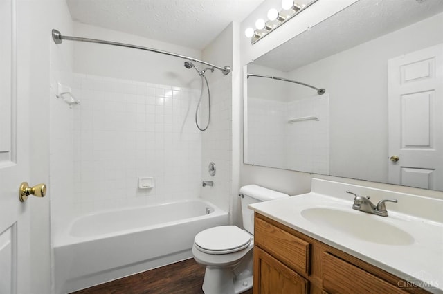 5433 Harbourwatch Unit 104, Deerfield Twp, OH 45040 - bathroom featuring vanity, tub / shower combination, wood finished floors, and a textured ceiling
