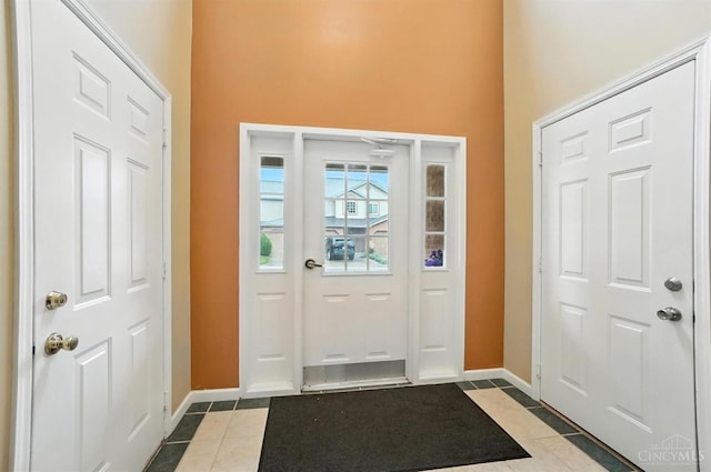 5433 Harbourwatch Unit 104, Deerfield Twp, OH 45040 - foyer entrance with a high ceiling and light tile patterned floors