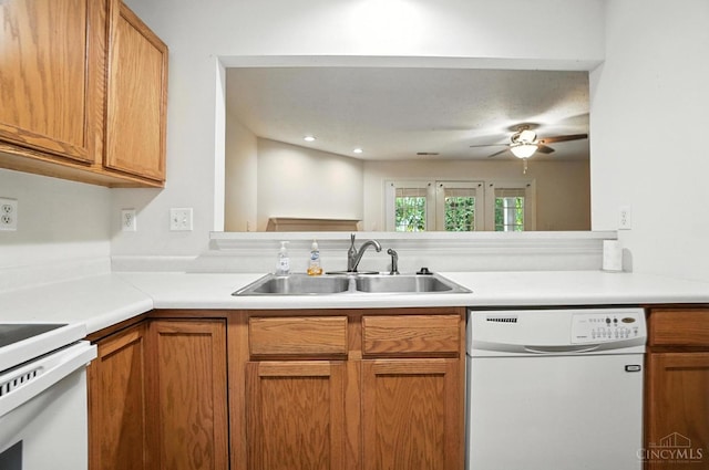 5433 Harbourwatch Unit 104, Deerfield Twp, OH 45040 - kitchen with white dishwasher, ceiling fan, light countertops, and brown cabinetry