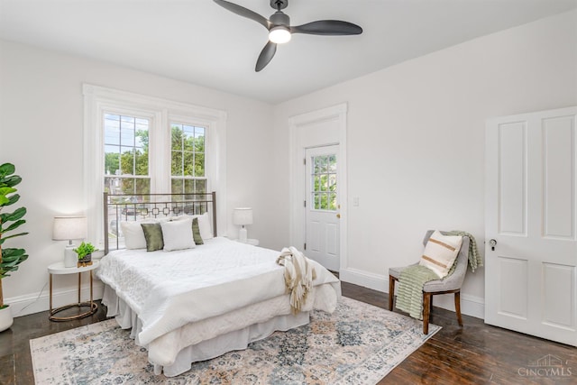 1419 Chase Ave, Cincinnati, OH 45223 - bedroom with multiple windows, wood finished floors, and a ceiling fan