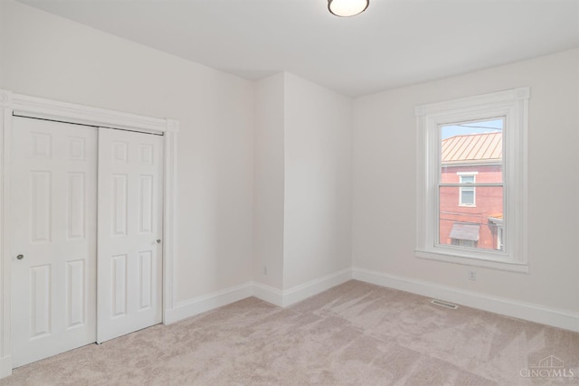 1419 Chase Ave, Cincinnati, OH 45223 - unfurnished bedroom featuring carpet floors and a closet