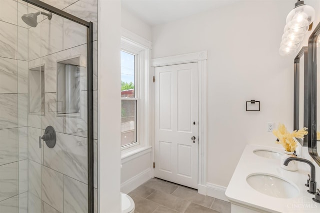 1419 Chase Ave, Cincinnati, OH 45223 - full bath featuring a shower stall, double vanity, and tile patterned floors