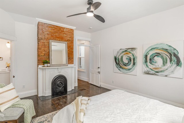 1419 Chase Ave, Cincinnati, OH 45223 - bedroom featuring wood finished floors, a large fireplace, and ceiling fan