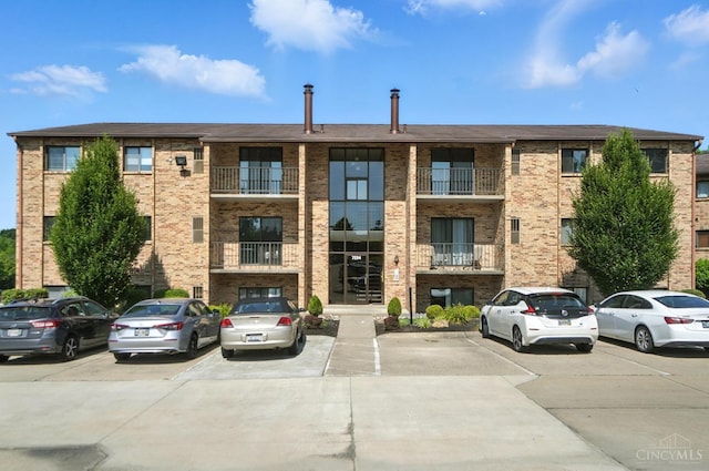 7234 Creekview Dr Unit 1, Colerain Twp, OH 45247 - view of building exterior with uncovered parking