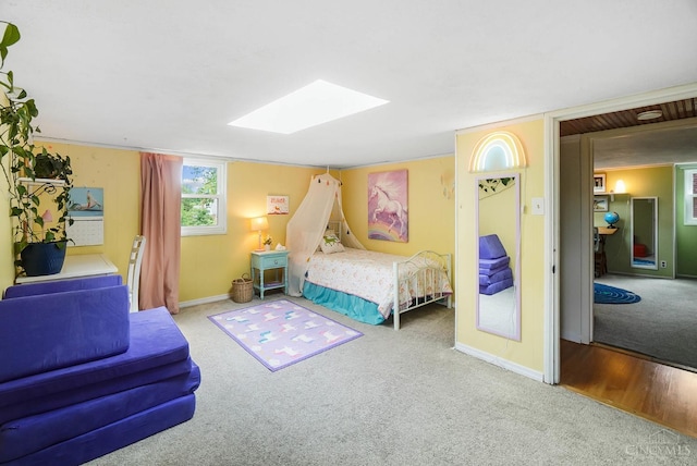1146 Wilshire Ave, Anderson Twp, OH 45230 - bedroom with carpet and a skylight