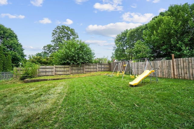 1146 Wilshire Ave, Anderson Twp, OH 45230 - fenced backyard with a playground