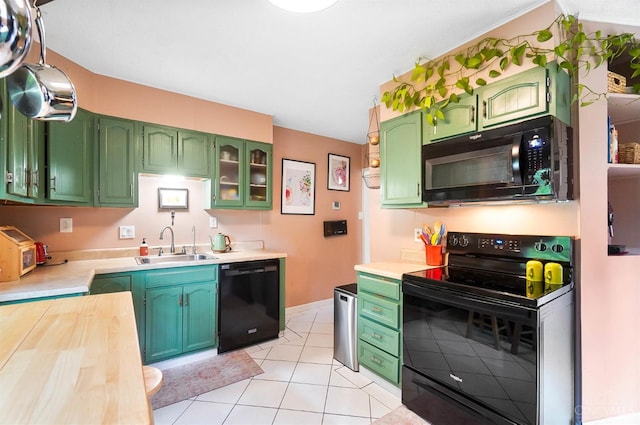 1146 Wilshire Ave, Anderson Twp, OH 45230 - kitchen featuring black appliances, light countertops, green cabinetry, and light tile patterned flooring