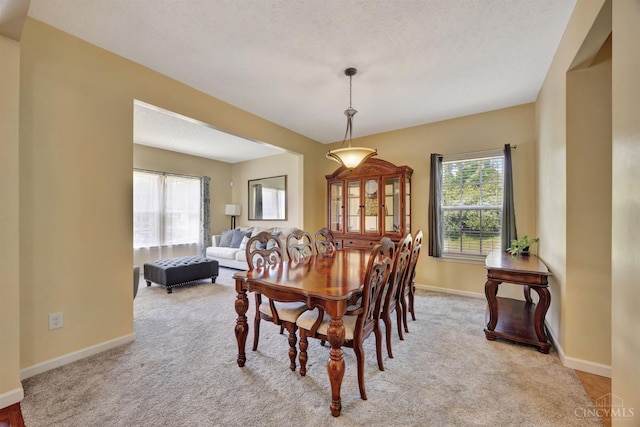 8020 Stoney Ridge Dr, Colerain Twp, OH 45247 - dining space featuring light colored carpet and a textured ceiling