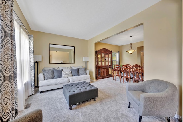 8020 Stoney Ridge Dr, Colerain Twp, OH 45247 - carpeted living room featuring healthy amount of natural light