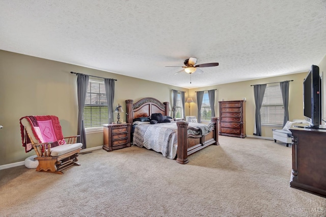 8020 Stoney Ridge Dr, Colerain Twp, OH 45247 - bedroom featuring light carpet, a textured ceiling, and a ceiling fan